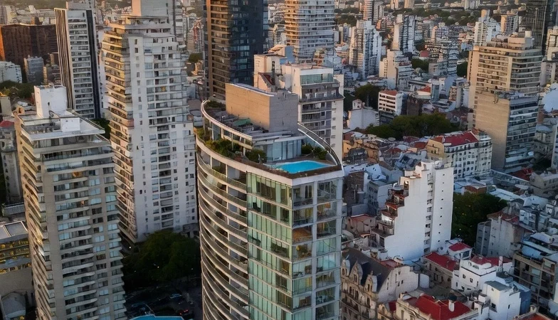 Luxury apartment buildings and urban real estate skyline in Buenos Aires, Argentina during sunset.