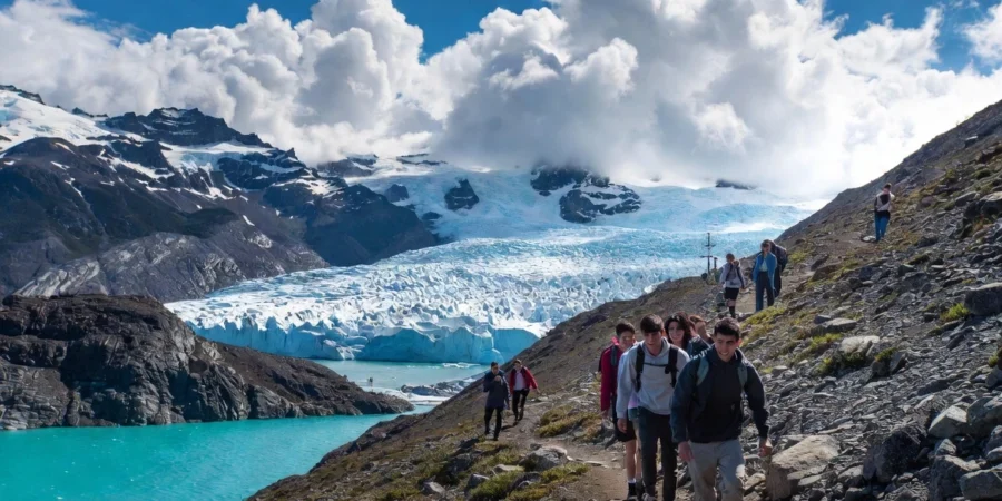 International students hiking in the stunning mountains of Patagonia, Argentina.
