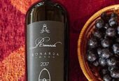 28 ACRES IN VINEYARD & ORCHARD Boutique Wine-Making Operation with House and Barns