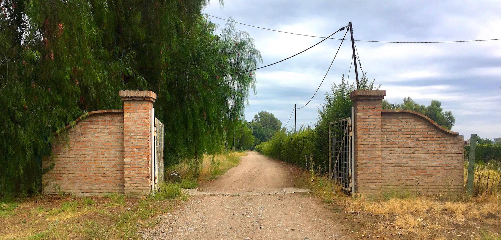 PRICE INCLUDES ALL CLOSING COSTS! 25 Acre Farm with Home & Pool, 8.5 Acres of Malbec Vineyard, Tourist Area Very Near Airport