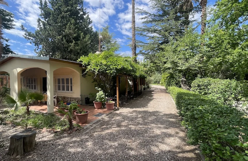 Gorgeous Walled Garden Property with Pool Home on Nearly One Acre. Completely Furnished!