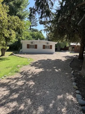 HOME WITH GUEST HOUSE ON 27 ACRES WITH LEVELED FARMLAND