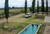 Charming Two-Story Pool Home, Malbec Vineyard & Orchard on 32 Acres with View